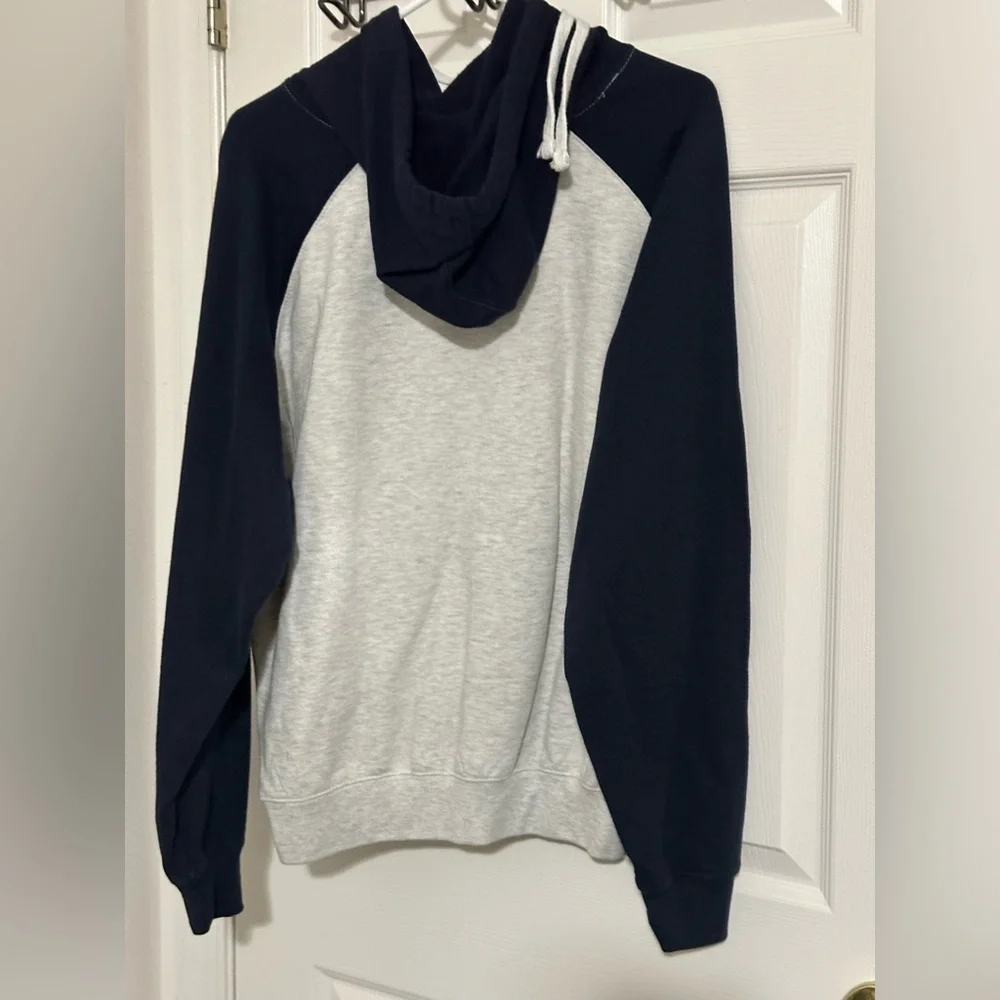 Brand new Sunsations hoodie in grey & navy. Size XL.